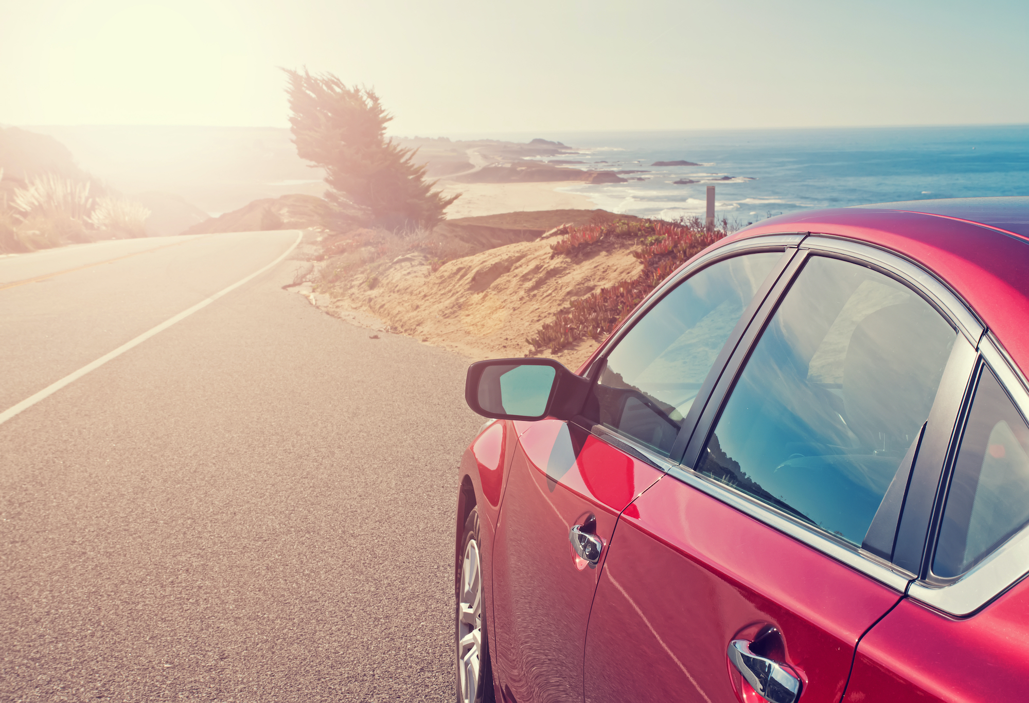 red car on beach